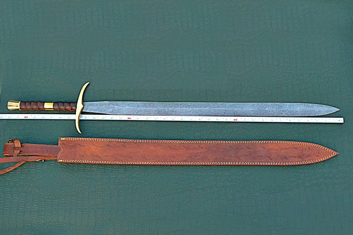 38 inches Long Claymore Sword, 30" Long Hand Forged Damascus Steel Double Edge Blade, Forward Brass Cross hilt Forward and Pommel, Leather Scabbard with Shoulder Stripe