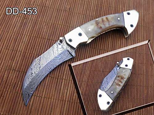 8" long Folding Knife with pocket clip, Hand forged Damascus steel 3.5" blade. Available in Walnut wood, Bull horn, Ram Horn, Red & Blue scale with Damascus Bolster, Cow hide Leather sheath