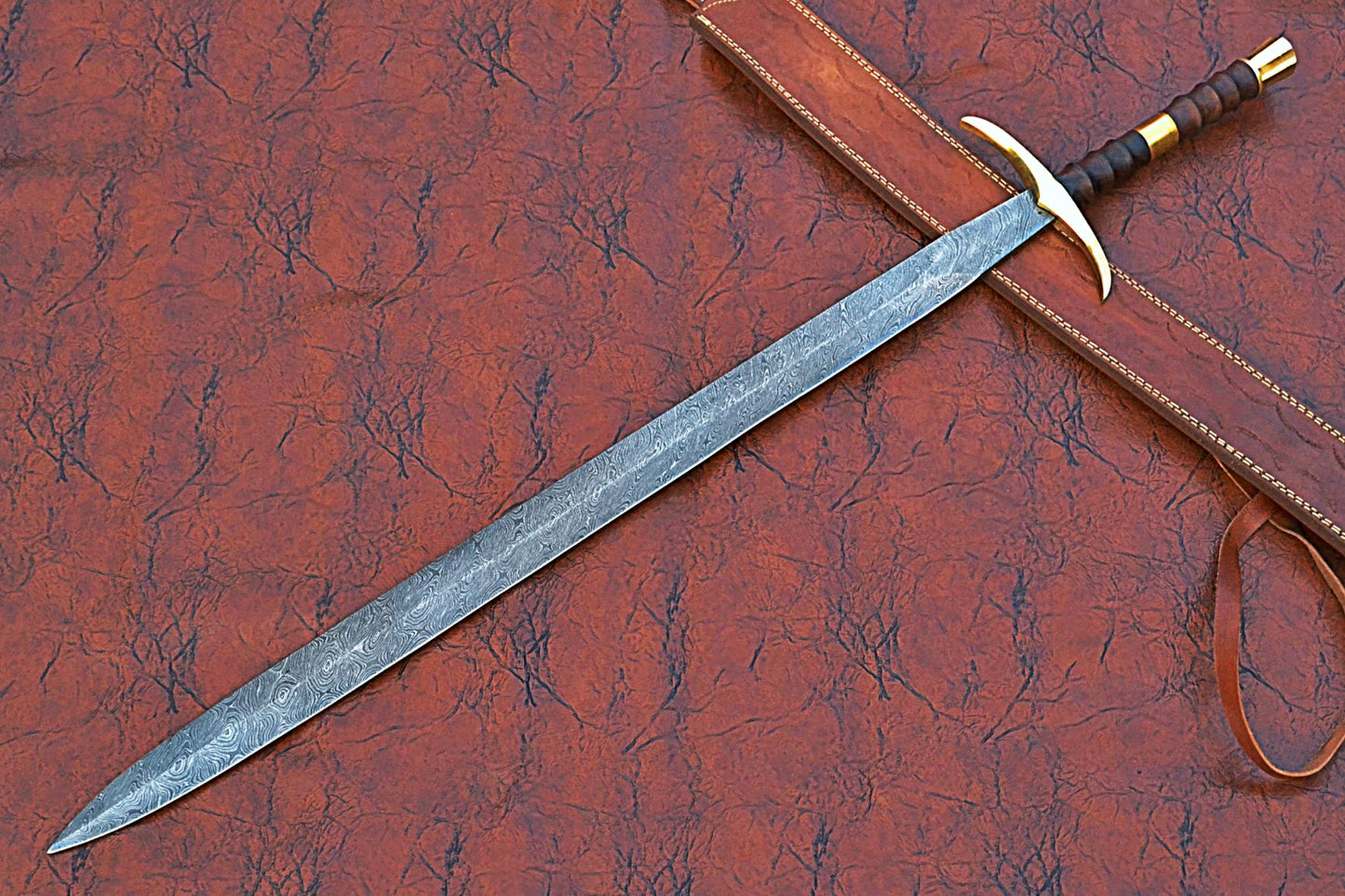 38 inches Long Claymore Sword, 30" Long Hand Forged Damascus Steel Double Edge Blade, Forward Brass Cross hilt Forward and Pommel, Leather Scabbard with Shoulder Stripe