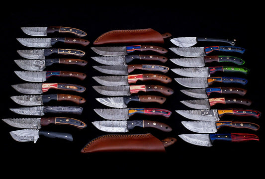 30 pieces Damascus steel fixed blade skinning knives lot with Leather sheath. Over 225 inches long Damascus steel knives in assorted colors