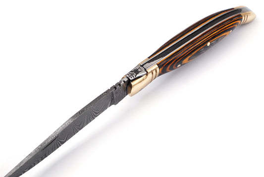 Copy of Folding Damascus steel knife, 8.5" Long with 4" hand forged custom twist pattern Blade. 2 tone Brown wood scale with brass bolster, Cow hide leather sheath included
