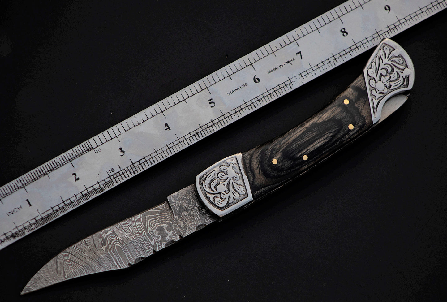 9" long back lock Folding Knife, 2 tone Red wood Scale with Engraved steel bolster, custom made 4" Hand Forged Damascus steel blade, Cow hide leather sheath with belt loop