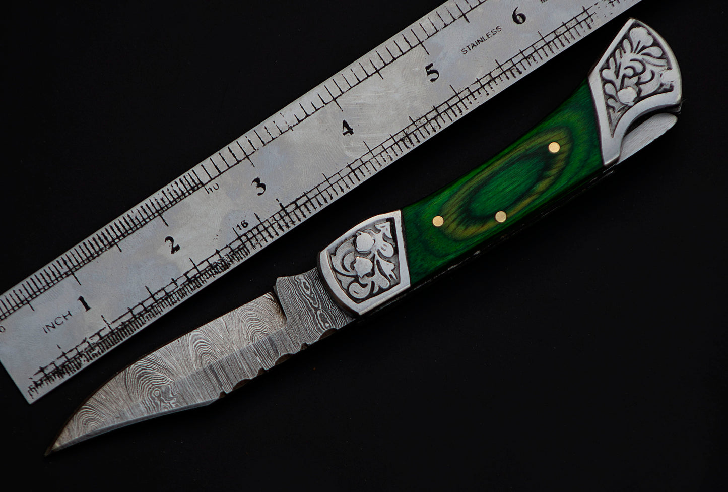 7" long back lock Folding Knife, Green colored wood Scale with Engraved steel bolster, custom made 3.25" Hand Forged Damascus steel blade, Cow hide leather sheath with belt loop