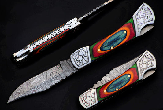 Copy of 7" long back lock Folding Knife, Blue & Orange colored wood Scale with Engraved steel bolster, custom made 3.25" Hand Forged Damascus steel blade, Cow hide leather sheath with belt loop