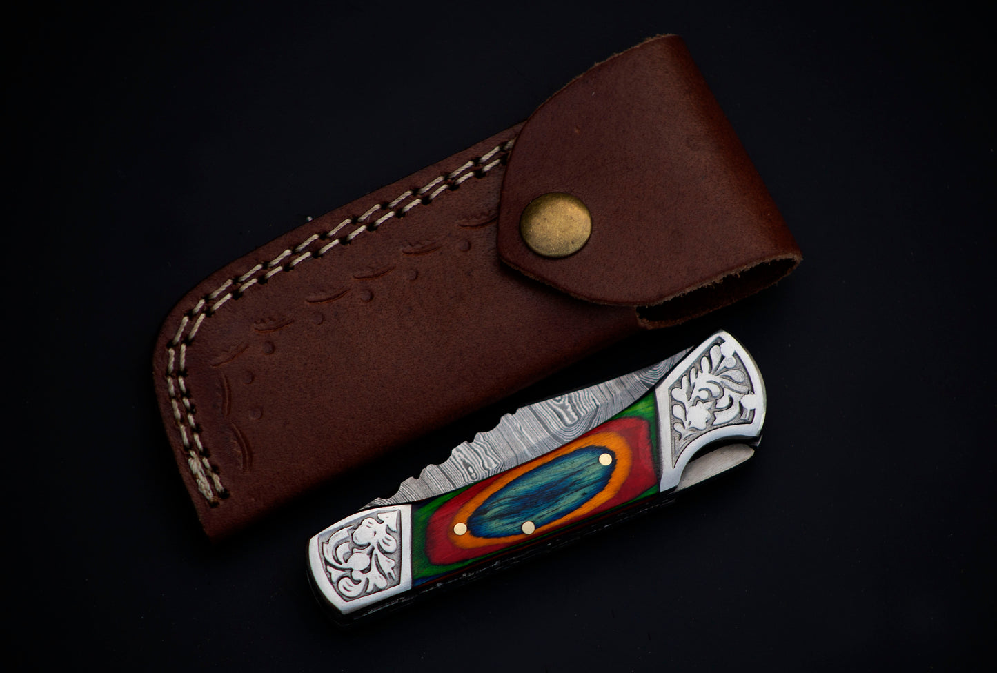 Copy of 7" long back lock Folding Knife, Blue & Orange colored wood Scale with Engraved steel bolster, custom made 3.25" Hand Forged Damascus steel blade, Cow hide leather sheath with belt loop