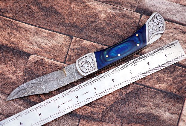9" long back lock Folding Knife, Blue wood Scale with Engraved steel bolster, custom made 4" Hand Forged Damascus steel blade, Cow hide leather sheath with belt loop