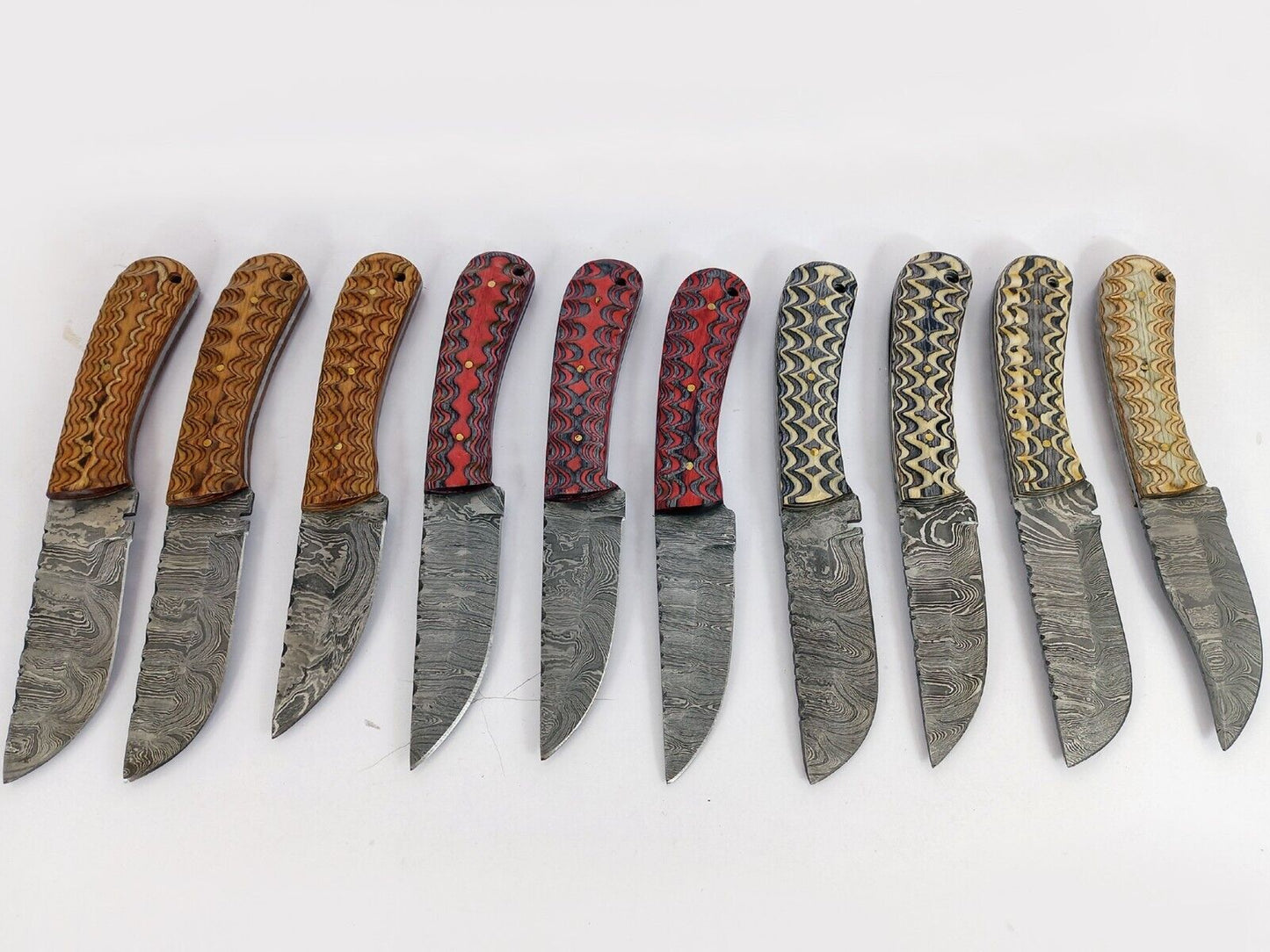 20 pieces Damascus steel fixed blade skinning knives lot with Leather sheath. Over 150 inches long Damascus steel knives in assorted colors
