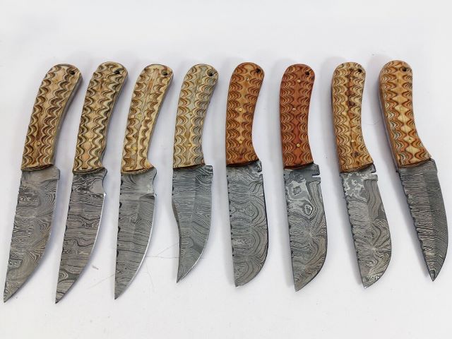 15 pieces Damascus steel fixed blade skinning knives lot with Leather sheath. Over 95 inches long Damascus steel knives in assorted colors