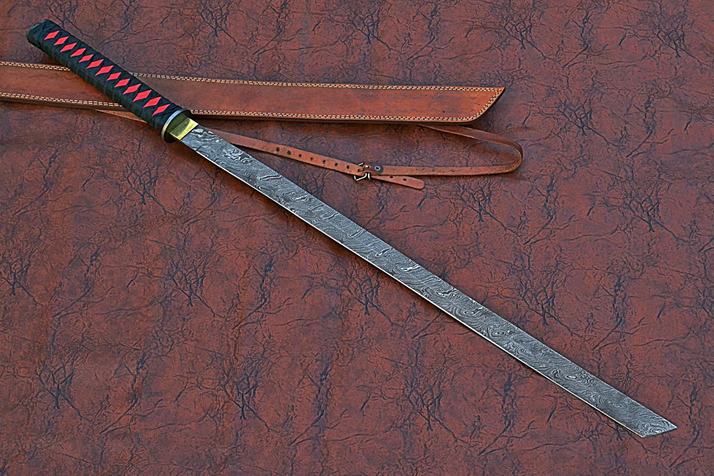 40 inches Long Ninja Sword, 28" Long Hand Forged Damascus Steel Blade, Steel Grip Wrapped with Black Fabric, Brass rain Guard, Includes Leather Scabbard with Shoulder Stripe