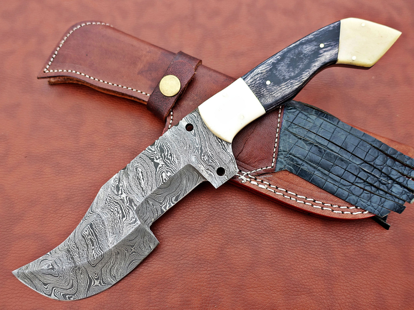 12" Long hand forged twist pattern full tang Damascus steel tracker knife, 2 tone dollar wood scale with Camel bone Bolster & pomel, Cow leather sheath