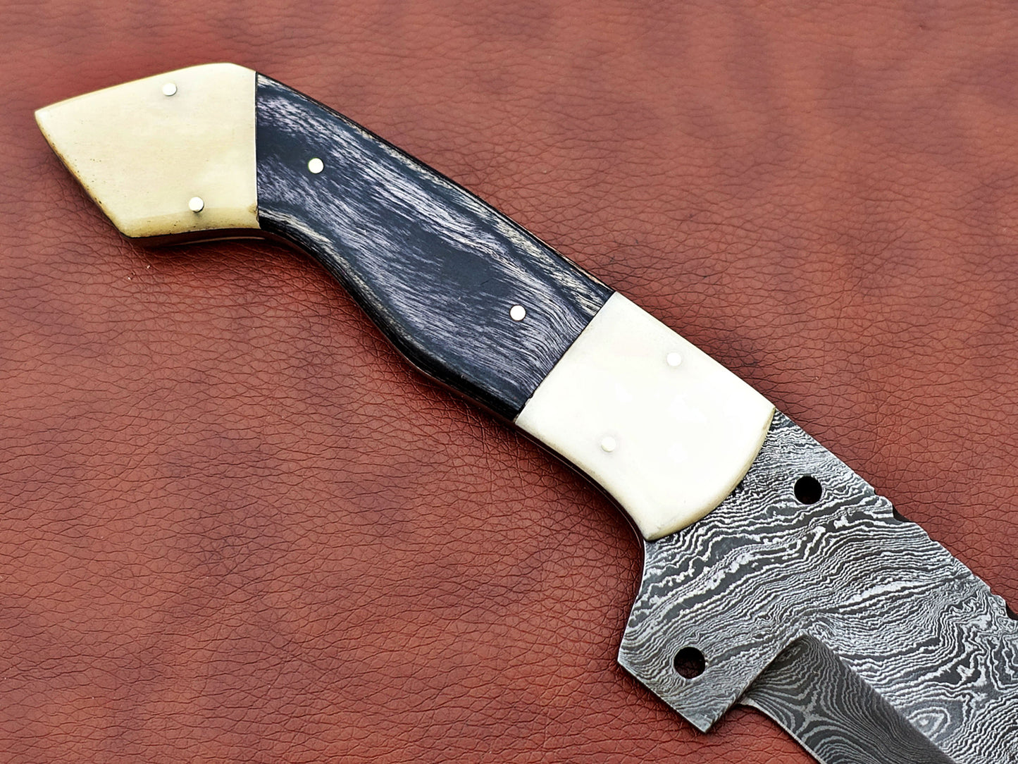 12" Long hand forged twist pattern full tang Damascus steel tracker knife, 2 tone dollar wood scale with Camel bone Bolster & pomel, Cow leather sheath