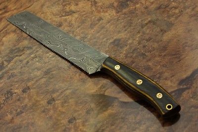 11.5" hand forged Damascus steel bread knife with 7" long serrated cutting edge, Cow Leather sheath included