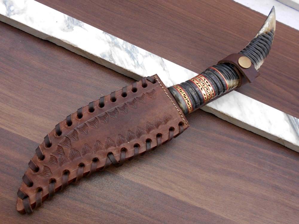 13" Long hand forged Damascus steel gut hook Skinning Knife, Custom made Round engraved jigged scale Crafted with engraved Brass spacer, Cow hide Leather sheath