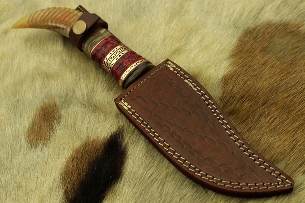 13" Long hand forged Damascus steel gut hook Skinning Knife, Custom made Round engraved jigged scale Crafted with engraved Brass spacer, Cow hide Leather sheath