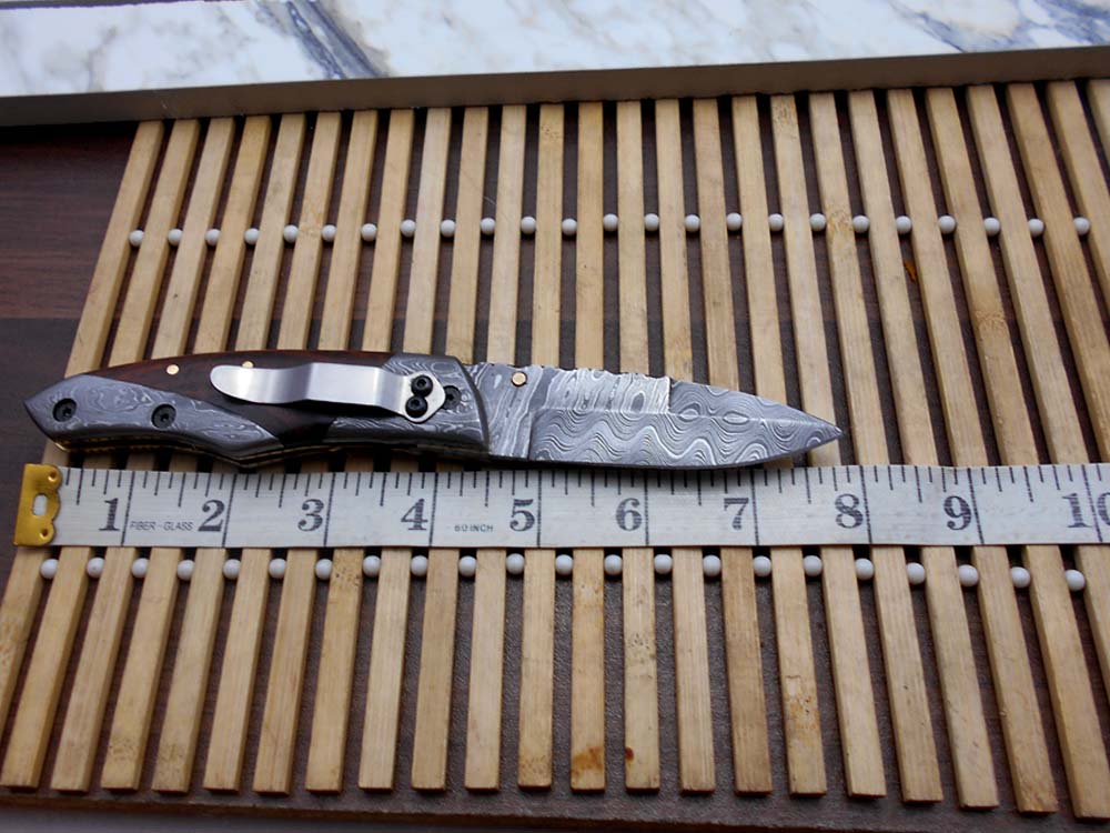 4 pieces Damascus steel folding knives set, Pocket clip, Liner lock, Leather sheath. Includes Black, Brown, Red & blue colors