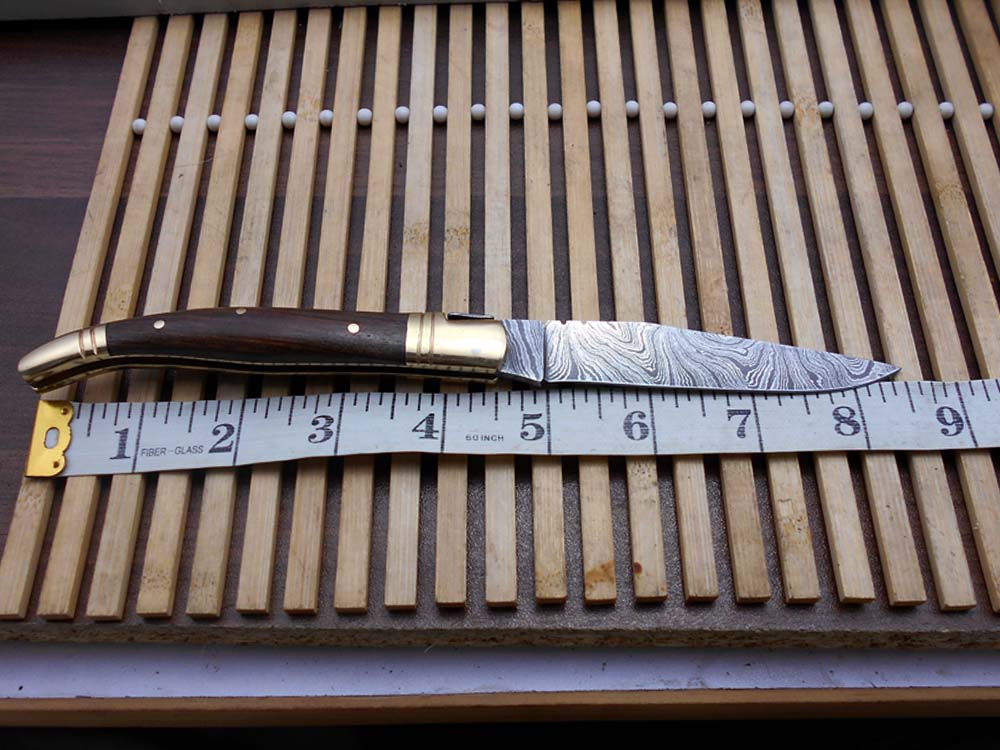 8.5" Damascus steel Laguiolle knife, Available in various scales with brass bolster, 4" twist pattern Blade, Cow hide leather sheath included