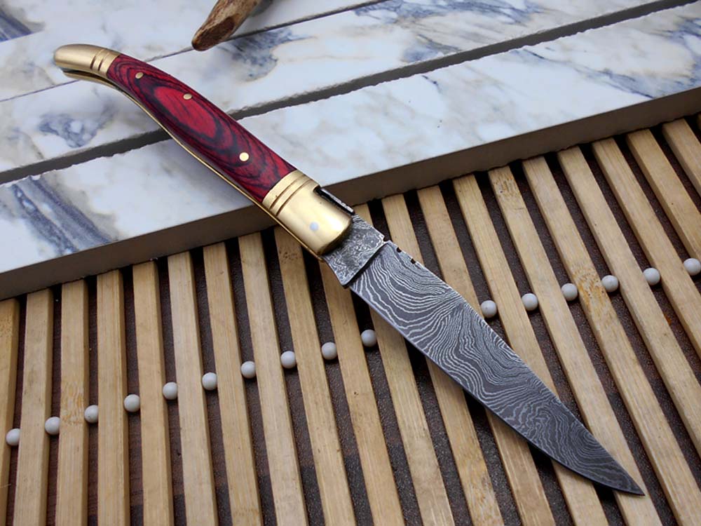 8.5" Damascus steel Laguiolle knife, Available in various scales with brass bolster, 4" twist pattern Blade, Cow hide leather sheath included
