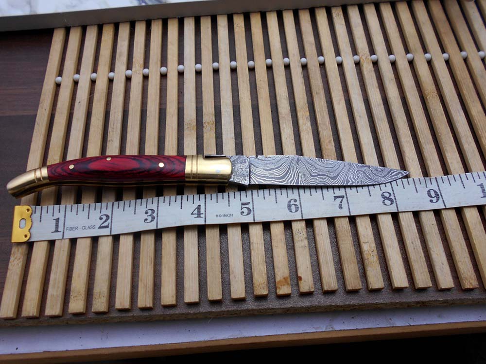 8.5" Damascus steel Laguiolle knife, Available in various scales with brass bolster, 4" twist pattern Blade, Cow hide leather sheath included