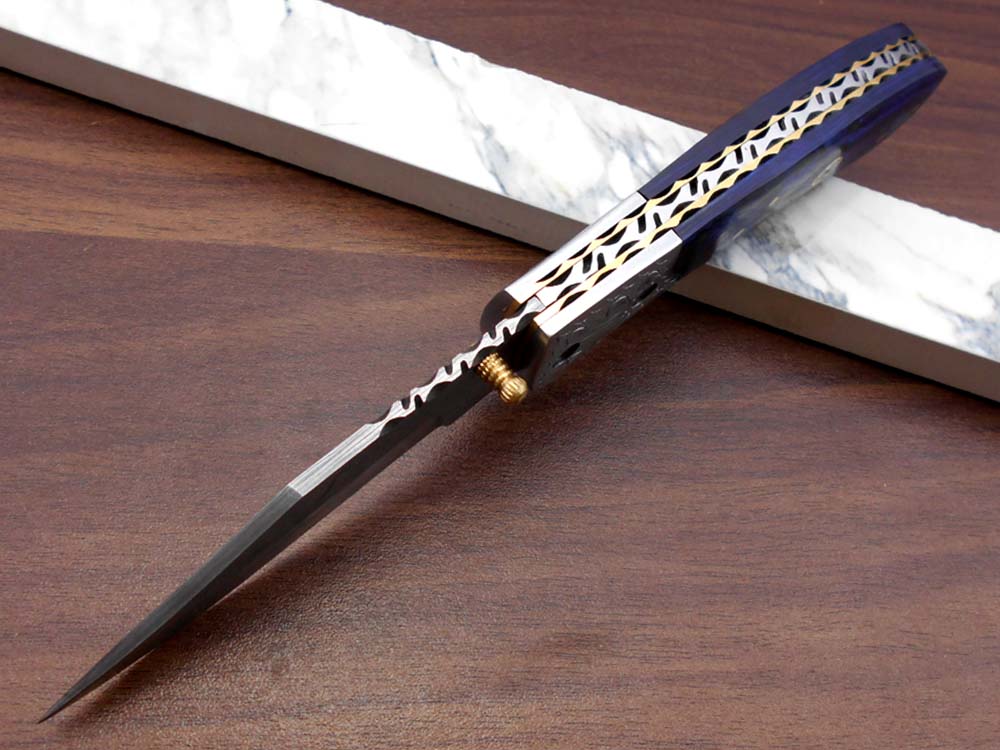 8" long hand forged custom made Damascus steel pocket clip folding knife, Blue Colored wood scale with engraved steel Bolster, Cow hide leather sheath included