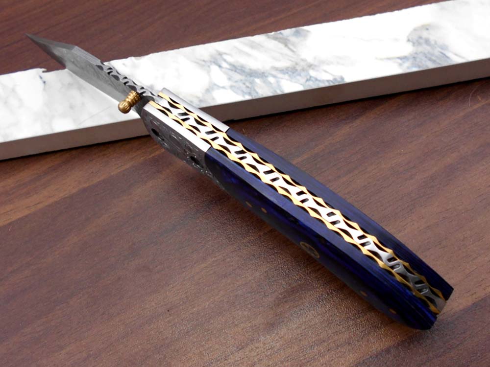 8" long hand forged custom made Damascus steel pocket clip folding knife, Blue Colored wood scale with engraved steel Bolster, Cow hide leather sheath included