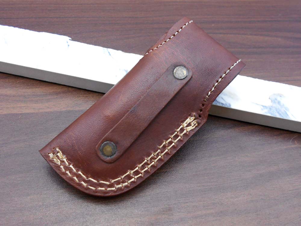 Damascus steel 7.5" long Folding Knife Bull horn with Damascus bolster pocket clip scale, custom made Hand Forged blade cow leather sheath