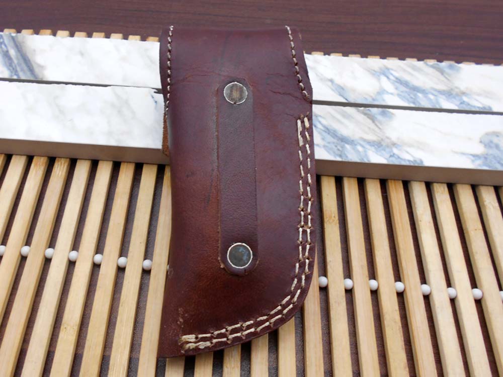 Damascus steel folding knife 7.5" long hand forged custom made 3.5" Tanto blade, Ram horn scale with Damascus bolster, Cow leather sheath