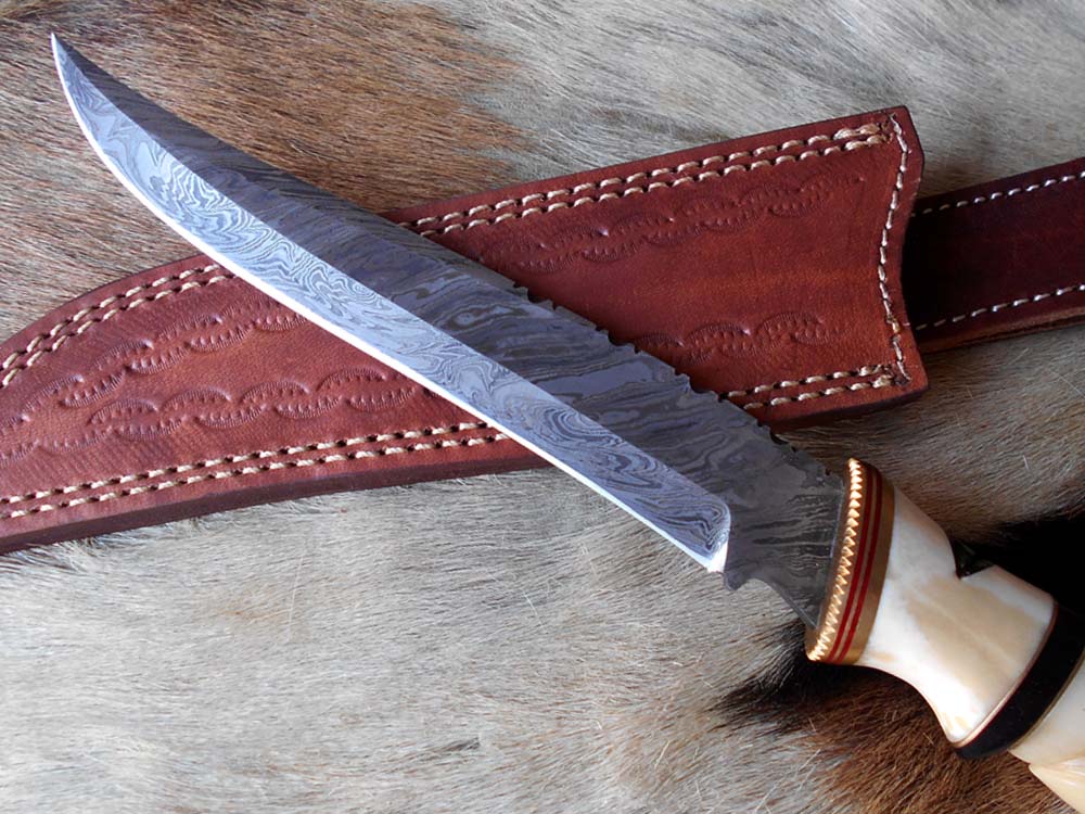 13 " long Damascus steel skinning knife, exotic hand carved Camel bone scale crafted with engraved brass, spacer and sliced bull horn, Cow hide leather sheath included.
