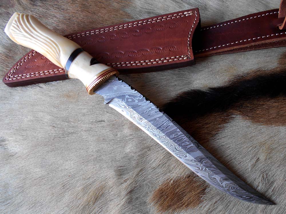 13 " long Damascus steel skinning knife, exotic hand carved Camel bone scale crafted with engraved brass, spacer and sliced bull horn, Cow hide leather sheath included.