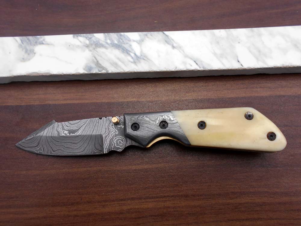 Damascus steel 7.5" long Folding Knife Bull horn with Damascus bolster pocket clip scale, custom made Hand Forged blade cow leather sheath
