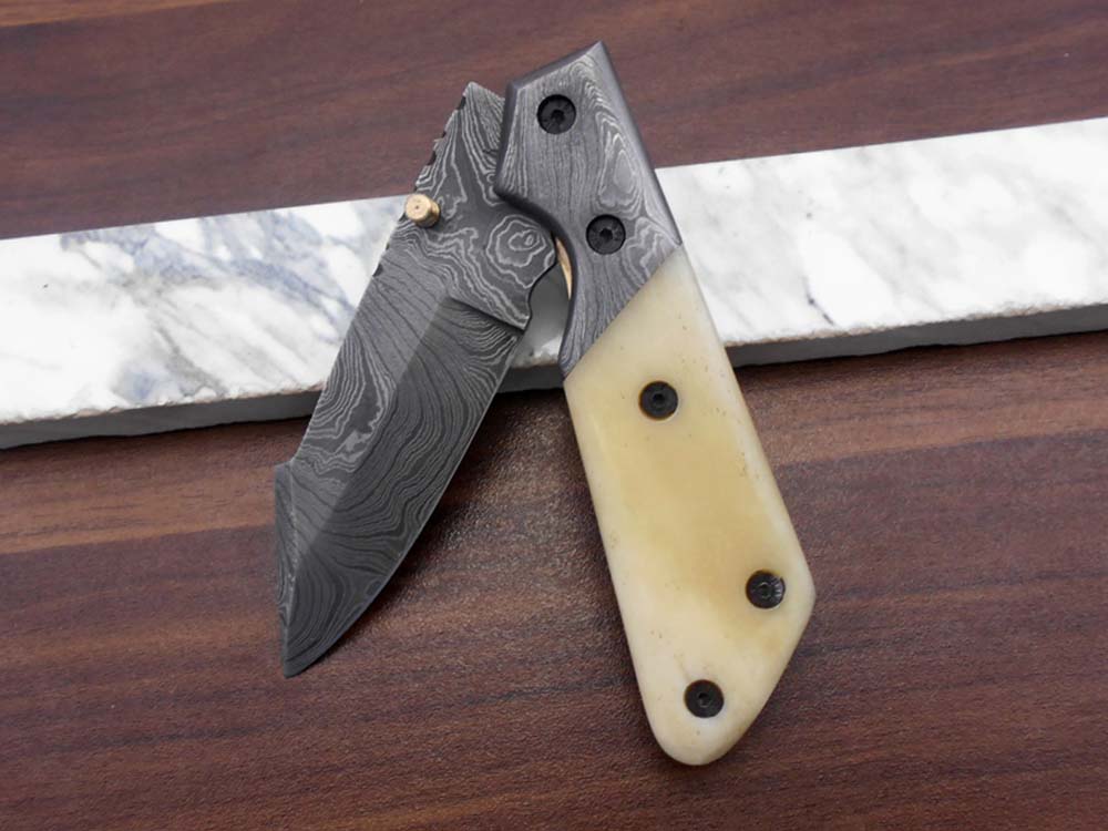 Damascus steel 7.5" long Folding Knife Bull horn with Damascus bolster pocket clip scale, custom made Hand Forged blade cow leather sheath