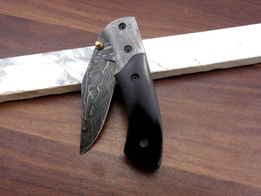 8.5" long hand forged custom made Damascus steel pocket clip folding knife, available in 4 scales options with Damascus Bolster, Comes with Cow hide leather sheath
