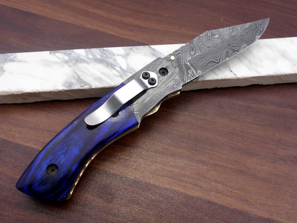 8.5" long hand forged custom made Damascus steel pocket clip folding knife, available in 4 scales options with Damascus Bolster, Comes with Cow hide leather sheath