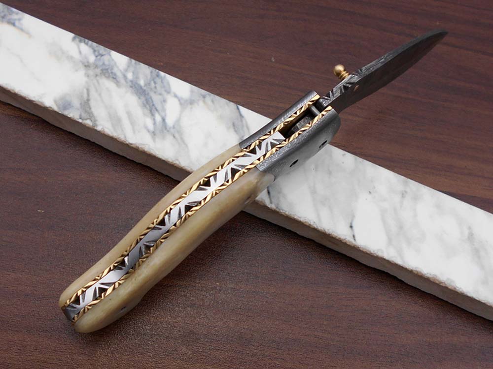 7.5" Folding Knife, 3.5" Legal Hand Forged Twist Pattern Damascus Steel Blade, Black and White Scales Available, Pocket Knife, Liner Lock & Thumb knob Equipped, Cow Hide Leather Sheath
