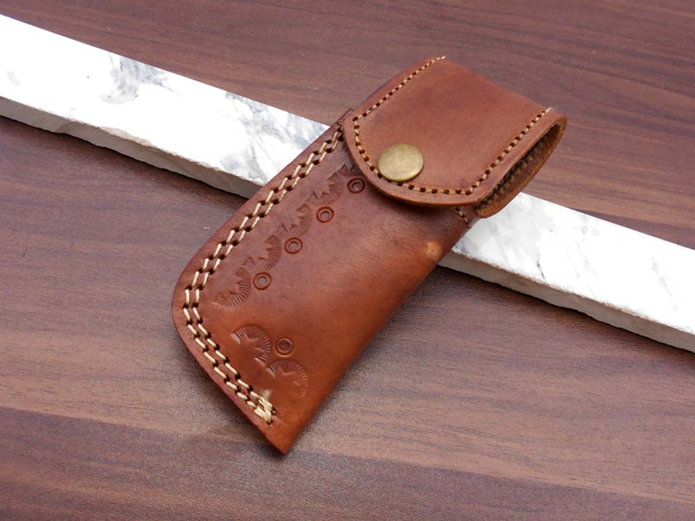 7.5" Folding Knife, 3.5" Legal Hand Forged Twist Pattern Damascus Steel Blade, Black and White Scales Available, Pocket Knife, Liner Lock & Thumb knob Equipped, Cow Hide Leather Sheath