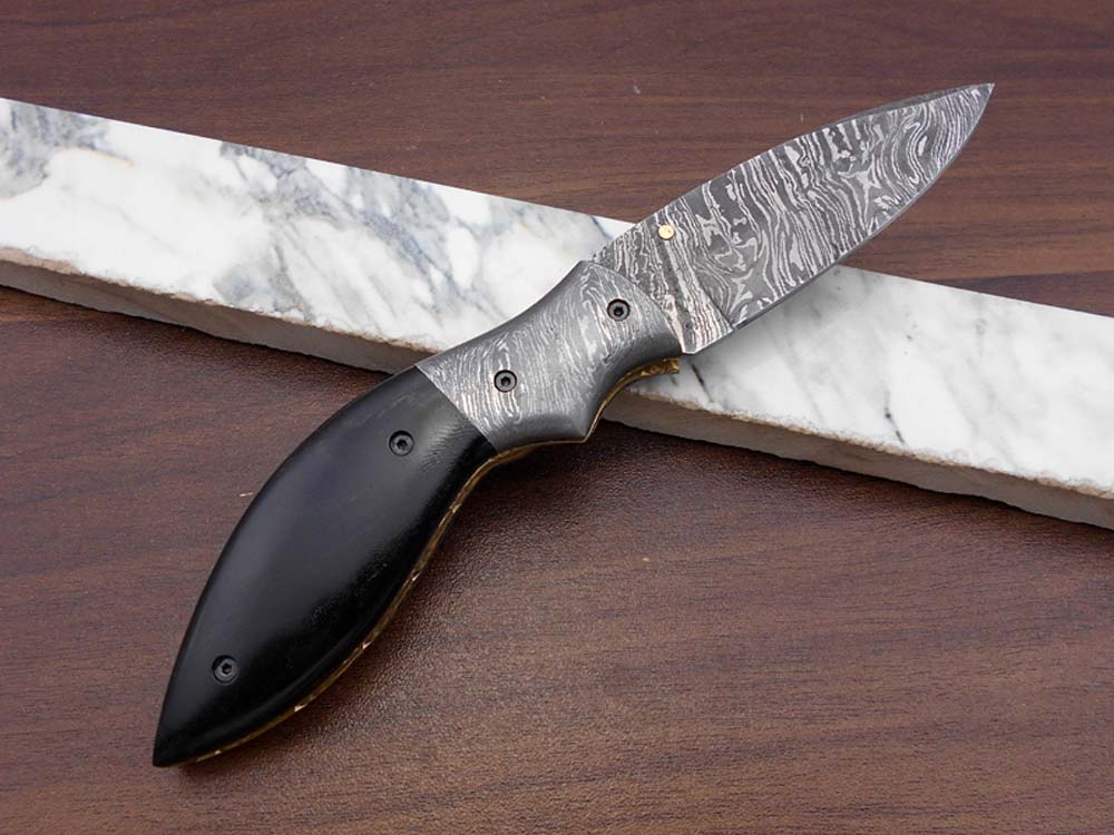 7.5" Folding Knife, 3.5" Legal Hand Forged Twist Pattern Damascus Steel Blade, Black and White Scales Available, Pocket Knife, Liner Lock & Thumb knob Equipped, Cow Hide Leather Sheath