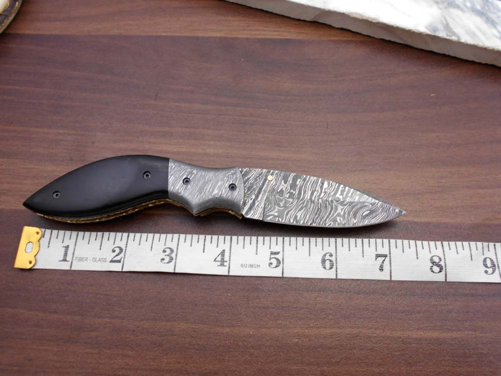 7.5" Folding Knife, 3.5" Legal Hand Forged Twist Pattern Damascus Steel Blade, Black and White Scales Available, Pocket Knife, Liner Lock & Thumb knob Equipped, Cow Hide Leather Sheath