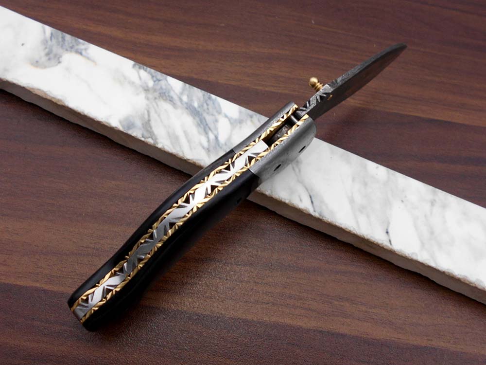 7.5" Folding Knife, 3.5" Legal Hand Forged Twist Pattern Damascus Steel Blade, Black and White Scales Available, Pocket Knife, Liner Lock & Thumb knob Equipped, Cow Hide Leather Sheath