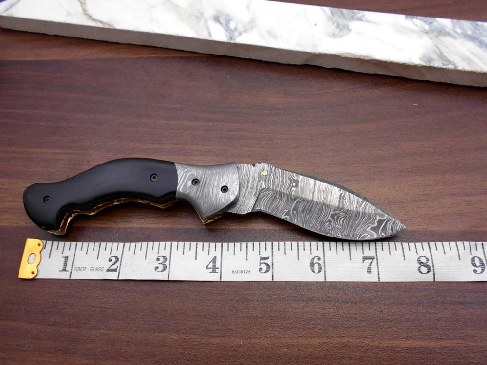 7.5" Folding Knife, 3.5" Legal Hand Forged Twist Pattern Damascus Steel Blade, Black and White Scales Available, Pocket Knife, Liner Lock & Thumb knob Equipped, Cow Hide Leather Sheath