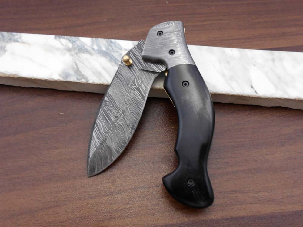 7.5" Folding Knife, 3.5" Legal Hand Forged Twist Pattern Damascus Steel Blade, Black and White Scales Available, Pocket Knife, Liner Lock & Thumb knob Equipped, Cow Hide Leather Sheath