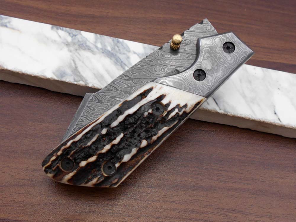 Damascus steel 7.5" long Folding Knife Bull horn with Damascus bolster pocket clip scale, custom made Hand Forged blade cow leather sheath
