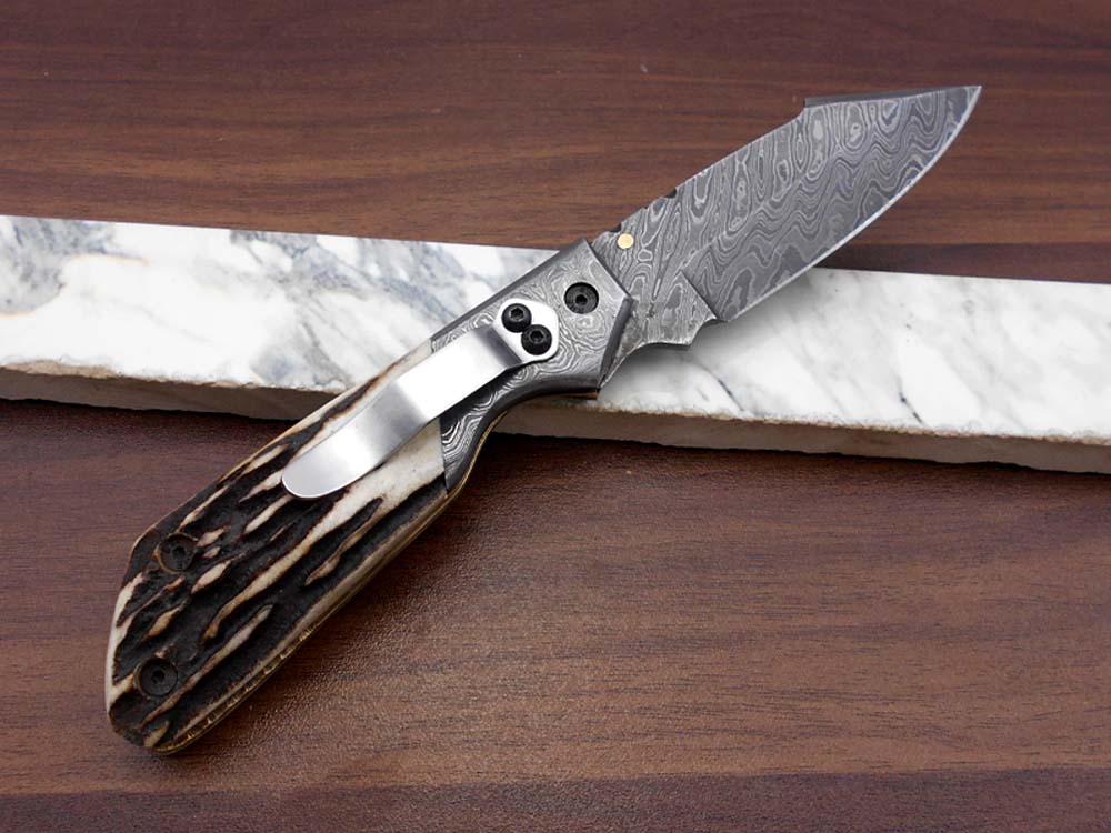 Damascus steel 7.5" long Folding Knife Bull horn with Damascus bolster pocket clip scale, custom made Hand Forged blade cow leather sheath