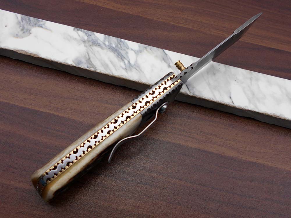 7.5" long Damascus steel Tanto blade folding knife, 6 natural scale with Damascus bolster, cow leather sheath W/ belt loop included