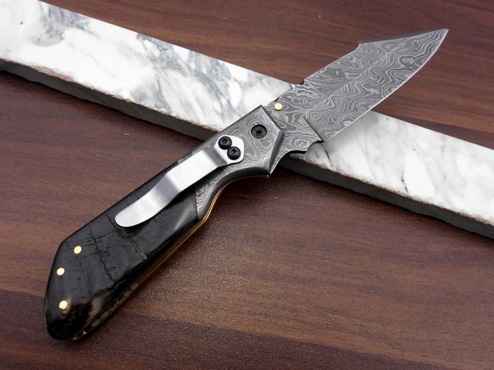 Damascus steel 7.5" long Folding Knife Bull horn with Damascus bolster pocket clip scale, custom made Hand Forged blade cow leather sheath