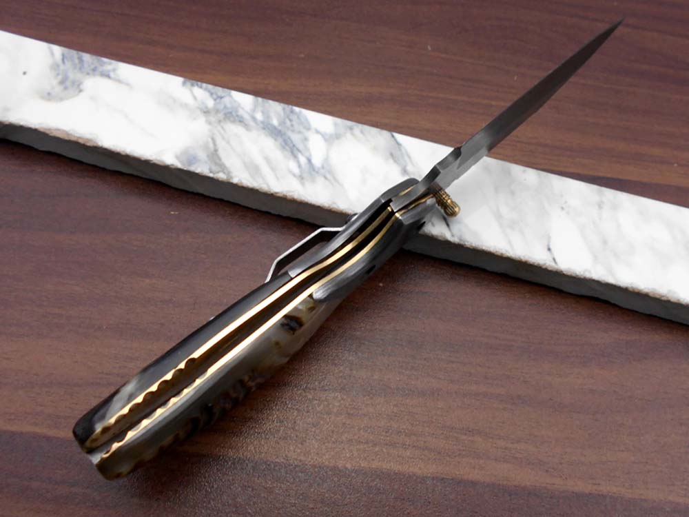 Damascus steel 7.5" long Folding Knife Bull horn with Damascus bolster pocket clip scale, custom made Hand Forged blade cow leather sheath