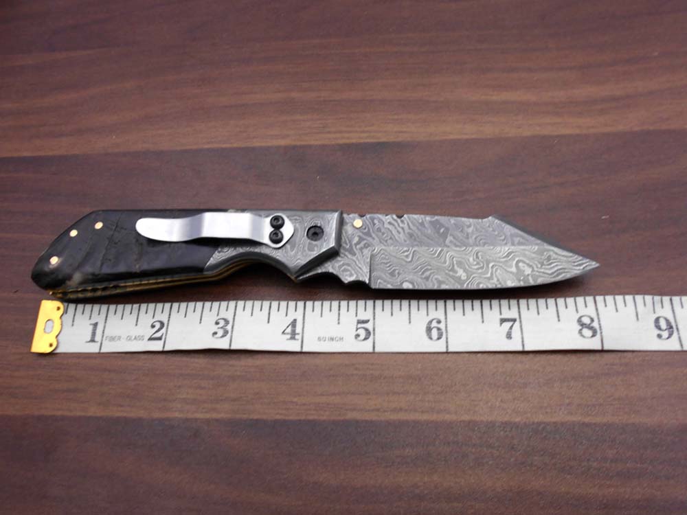 Damascus steel 7.5" long Folding Knife Bull horn with Damascus bolster pocket clip scale, custom made Hand Forged blade cow leather sheath
