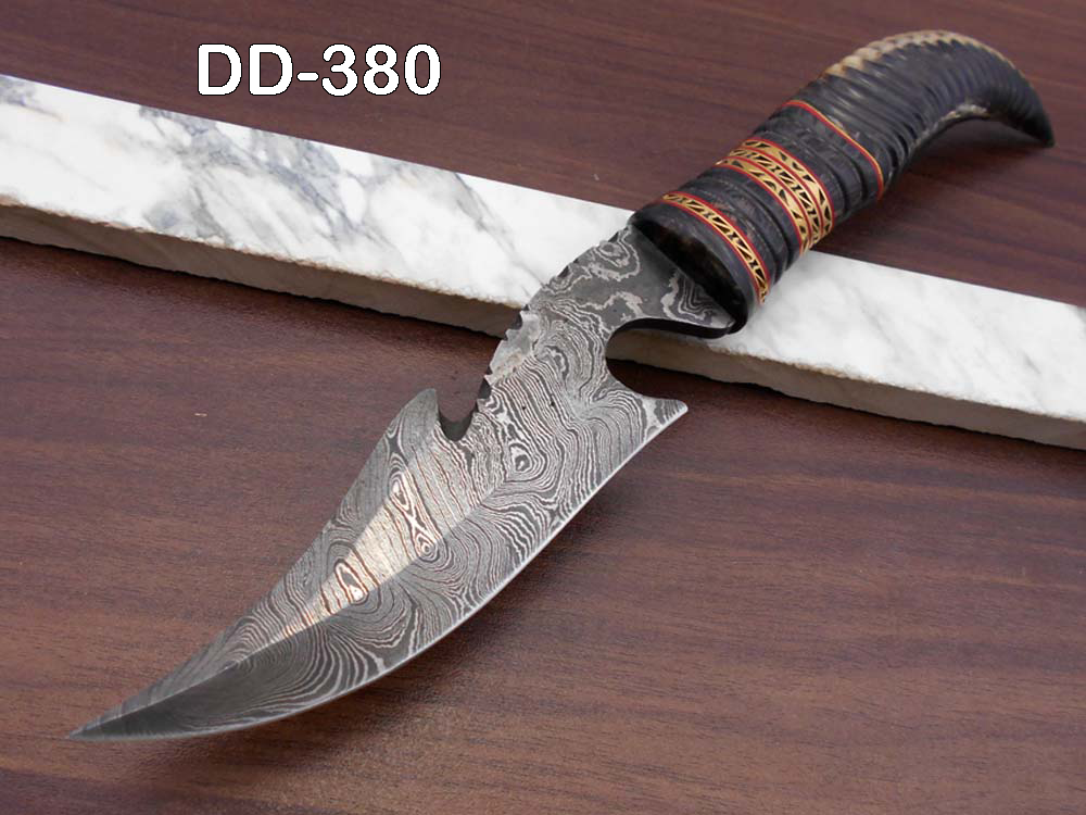 13" Long hand forged Damascus steel gut hook Skinning Knife, Custom made Round engraved jigged scale Crafted with engraved Brass spacer, Cow hide Leather sheath