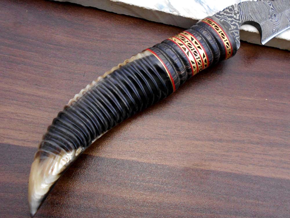 13" Long hand forged Damascus steel gut hook Skinning Knife, Custom made Round engraved jigged scale Crafted with engraved Brass spacer, Cow hide Leather sheath