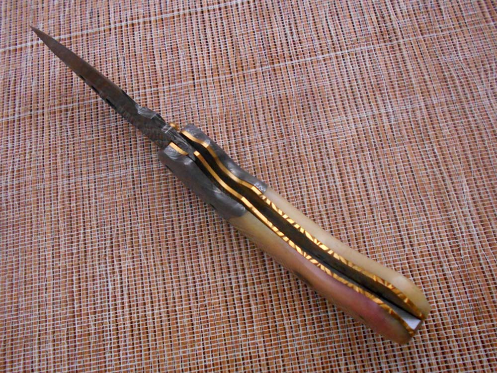 7.5" Folding Knife, 3.5" Hand Forged Twist Pattern Damascus Steel Blade with 3 Holes, Available in 3 Scale colors Pocket Knife, Liner Lock & Thumb knob Equipped, Cow Hide Leather Sheath included