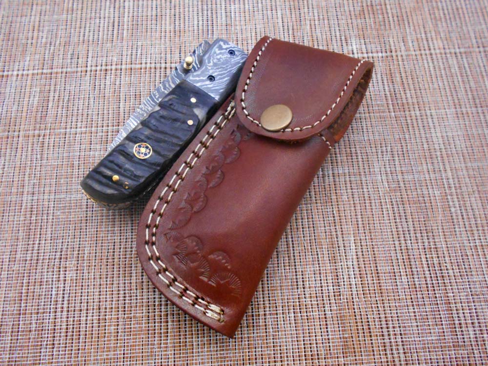 7.75" Damascus steel folding knife, liner lock, thumb knob, Cow sheath