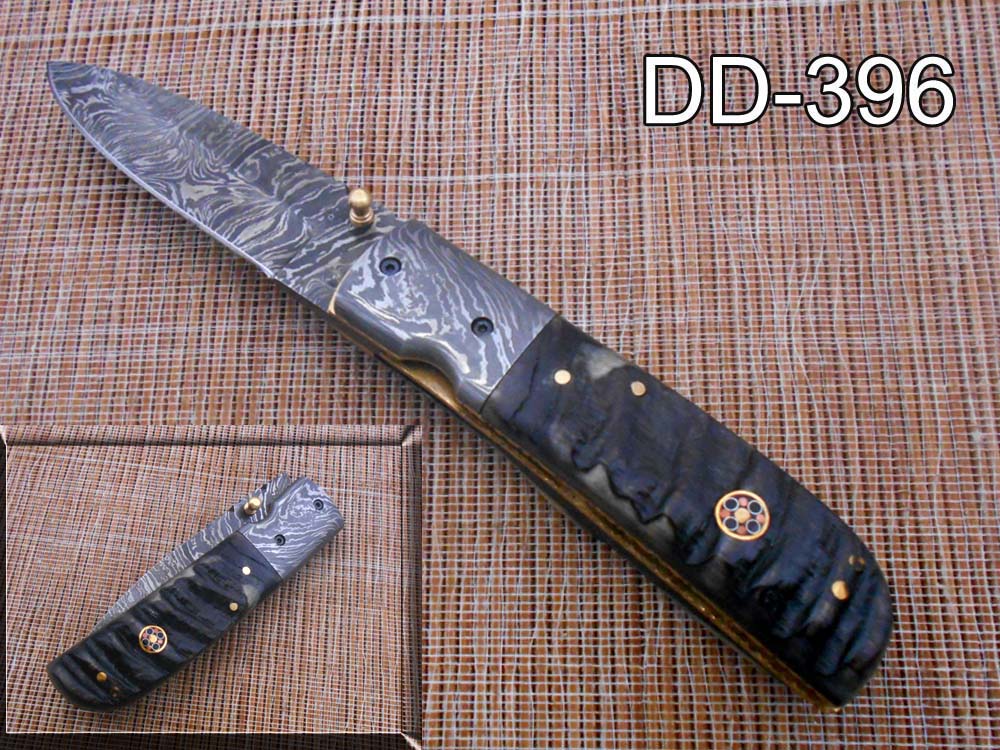 7.75" Damascus steel folding knife, liner lock, thumb knob, Cow sheath